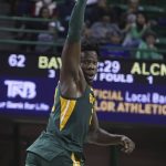 
              Baylor forward Jonathan Tchamwa Tchatchoua reacts to his score in the second half of an NCAA college basketball game against Alcorn State, Monday, Dec. 20, 2021, in Waco, Texas. (AP Photo/Rod Aydelotte)
            