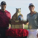 
              Viktor Hovland, of Norway, right, and Tiger Woods pose with the championship trophy after the final round the Hero World Challenge PGA Tour at the Albany Golf Club, in New Providence, Bahamas, Sunday, Dec. 5, 2021. Viktor Hovland won the tournament with -17 strokes. (AP Photo/Fernando Llano)
            