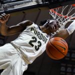 
              Purdue guard Jaden Ivey (23) reacts after a dunk against Iowa during the second half of an NCAA college basketball game in West Lafayette, Ind., Friday, Dec. 3, 2021. (AP Photo/Michael Conroy)
            