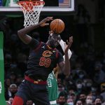 
              Cleveland Cavaliers' Tacko Fall has the ball bounce off his head during the second quarter of the team's NBA basketball game against the Boston Celtics on Wednesday, Dec. 22, 2021, in Boston. (AP Photo/Winslow Townson)
            