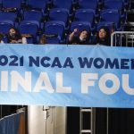
              FILE - Fans watch from the stands during the first half of the championship game between Stanford and Arizona in the women's Final Four NCAA college basketball tournament in San Antonio, April 4, 2021. (AP Photo/Eric Gay, File)
            