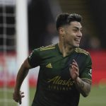 
              Portland Timbers forward Felipe Mora celebrates after scoring a goal against Real Salt Lake during the first half of the MLS soccer Western Conference final Saturday, Dec. 4, 2021, in Portland, Ore. (AP Photo/Amanda Loman)
            