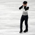 
              Yuma Kagiyama of Japan reacts after performing during men's short program competition of Japan Figure Skating Championships at Saitama Super Arena, in Saitama, north of Tokyo, Friday, Dec. 24, 2021. (AP Photo/Eugene Hoshiko)
            