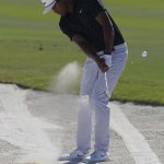 
              Tony Finau, of the United States, hits out of sand on the third hole during the first round of the Hero World Challenge PGA Tour at the Albany Golf Club, in New Providence, Bahamas, Thursday, Dec. 2, 2021.(AP Photo/Fernando Llano)
            