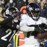 
              Baltimore Ravens wide receiver Sammy Watkins (14) makes a touchdown catch as Pittsburgh Steelers cornerback Tre Norwood (21) defends during the second half of an NFL football game, Sunday, Dec. 5, 2021, in Pittsburgh. The Steelers won 20-19. (AP Photo/Don Wright)
            