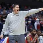 
              Clemson coach Brad Brownell reacts to a call during the team's NCAA college basketball game against Virginia in Charlottesville, Va., Wednesday, Dec. 22, 2021. (AP Photo/Andrew Shurtleff)
            