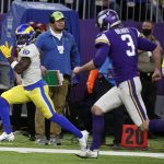 
              Los Angeles Rams' Brandon Powell (19) runs from Minnesota Vikings punter Jordan Berry (3) during a 61-yard punt return for a touchdown in the second half of an NFL football game, Sunday, Dec. 26, 2021, in Minneapolis. (AP Photo/Bruce Kluckhohn)
            