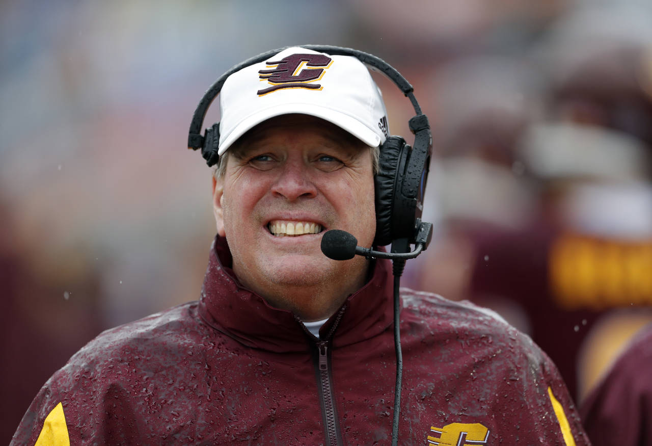 Central Michigan coach Jim McElwain walks the sidelines during the first half of the Sun Bowl NCAA ...