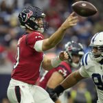 
              Houston Texans quarterback Davis Mills (10) throws under pressure by Indianapolis Colts defensive tackle Grover Stewart (90) during the second half of an NFL football game, Sunday, Dec. 5, 2021, in Houston. (AP Photo/Eric Christian Smith)
            