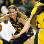 
              Missouri forward Hayley Frank (43) drives to the basket past Baylor forward Caitlin Bickle (51) in the first half of an NCAA college basketball game in Waco, Texas, Saturday, Dec. 4, 2021. (AP Photo/Emil Lippe)
            