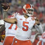 
              Clemson quarterback D.J. Uiagalelei (5) throws a pass during the first half of the Cheez-It Bowl NCAA college football game against Iowa State, Wednesday, Dec. 29, 2021, in Orlando, Fla. (AP Photo/Phelan M. Ebenhack)
            