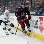 
              Columbus Blue Jackets' Max Domi, right, jumps the stick of San Jose Sharks' Erik Karlsson during the second period of an NHL hockey game Sunday, Dec. 5, 2021, in Columbus, Ohio. (AP Photo/Jay LaPrete)
            