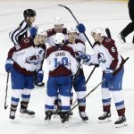 
              The Colorado Avalanche celebrate a goal against the New York Rangers during the third period of an NHL hockey game, Wednesday, Dec. 8, 2021, in New York. The Colorado Avalanche won 7-3. (AP Photo/Noah K. Murray)
            