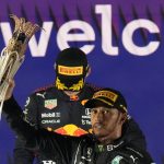 
              Mercedes driver Lewis Hamilton of Britain celebrates winning the Formula One Saudi Arabian Grand Prix in front of the second placed Red Bull driver Max Verstappen of the Netherlands, in Jiddah, Sunday, Dec. 5, 2021. (AP Photo/Hassan Ammar)
            