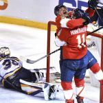 
              Florida Panthers center Sam Reinhart celebrates a goal against the St. Louis Blues with teammate left wing Jonathan Huberdeau (11) during the second period of an NHL hockey game Saturday, Dec. 4, 2021, in Sunrise, Fla. (AP Photo/Jim Rassol)
            