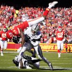 
              Kansas City Chiefs wide receiver Byron Pringle (13) is hit by Las Vegas Raiders safety Johnathan Abram (24) during the first half of an NFL football game Sunday, Dec. 12, 2021, in Kansas City, Mo. (AP Photo/Ed Zurga)
            