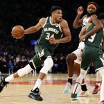
              Milwaukee Bucks forward Giannis Antetokounmpo (34) drives to the basket against the New York Knicks during the second half of an NBA basketball game in New York, Sunday, Dec. 12, 2021. (AP Photo/Noah K. Murray)
            