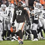 
              Cleveland Browns defensive tackle Malik Jackson (97) walks off the field as the Las Vegas Raiders celebrate a win in an NFL football game, Monday, Dec. 20, 2021, in Cleveland. (AP Photo/David Richard)
            
