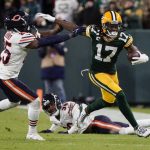 
              Green Bay Packers' Davante Adams tries to get past Chicago Bears' Artie Burns during the second half of an NFL football game Sunday, Dec. 12, 2021, in Green Bay, Wis. (AP Photo/Morry Gash)
            