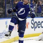 
              Tampa Bay Lightning left wing Ondrej Palat (18) celebrates after scoring the game-winning goal against the Montreal Canadiens during overtime of an NHL hockey game Tuesday, Dec. 28, 2021, in Tampa, Fla. (AP Photo/Chris O'Meara)
            