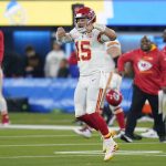 
              Kansas City Chiefs quarterback Patrick Mahomes (15) celebrates after the Chiefs defeated the Los Angeles Chargers in an NFL football game Thursday, Dec. 16, 2021, in Inglewood, Calif. The Chiefs won 34-28. (AP Photo/Ashley Landis)
            