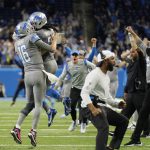 
              The Detroit Lions celebrate their last second come from behind win over th eMinnesota Vikings in an NFL football game, Sunday, Dec. 5, 2021, in Detroit. (AP Photo/Paul Sancya)
            