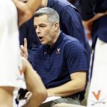 
              Virginia head coach Tony Bennett talks with players in the huddle during an NCAA college basketball game against Pittsburgh in Charlottesville, Va., Friday, Dec. 3, 2021. (AP Photo/Andrew Shurtleff)
            