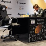 
              Magnus Carlsen of Norway competes during the FIDE World Championship at Dubai Expo 2020 in Dubai, United Arab Emirates, Friday, Dec. 10, 2021. (AP Photo/Jon Gambrell)
            