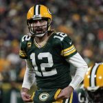 
              Green Bay Packers' Aaron Rodgers takes a snap during the second half of an NFL football game against the Chicago Bears Sunday, Dec. 12, 2021, in Green Bay, Wis. (AP Photo/Morry Gash)
            