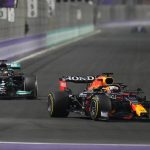 
              Red Bull driver Max Verstappen of the Netherlands, front, and Mercedes driver Lewis Hamilton of Britain in action t during the Formula One Saudi Arabian Grand Prix in Jiddah, Sunday, Dec. 5, 2021. (AP Photo/Hassan Ammar)
            