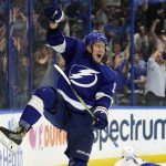 
              Tampa Bay Lightning left wing Ondrej Palat (18) celebrates after scoring the game-wiinning goal against the Montreal Canadiens during overtime of an NHL hockey game Tuesday, Dec. 28, 2021, in Tampa, Fla. (AP Photo/Chris O'Meara)
            