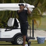 
              Tiger Woods watches his shot during a practice session at the Albany Golf Club, on the sidelines of day three of the Hero World Challenge Golf tour, in New Providence, Bahamas, Saturday, Dec. 4, 2021. (AP Photo/Fernando Llano)
            