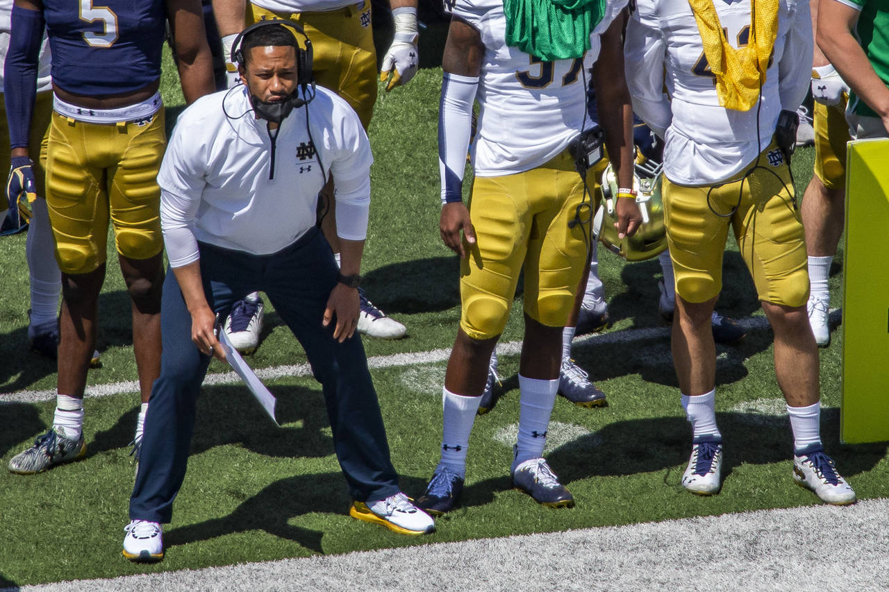 FILE - In this May 1, 2021, file photo, Notre Dame defensive coordinator Marcus Freeman watches dur...
