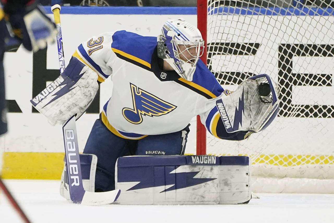 St. Louis Blues emergency goaltender Kyle Konin warms up before an NHL hockey game against the Tamp...