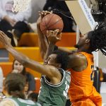 
              Cleveland State forward Deante Johnson (35) and Oklahoma State forward Kalib Boone, right, fight for a rebound in the second half of an NCAA college basketball game Monday, Dec. 13, 2021, in Stillwater, Okla. (AP Photo/Sue Ogrocki)
            