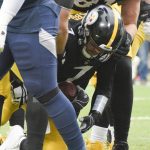 
              Pittsburgh Steelers quarterback Ben Roethlisberger (7) is helped up by tight end Zach Gentry (81) after scoring a touchdown against the Tennessee Titans during the second half of an NFL football game, Sunday, Dec. 19, 2021, in Pittsburgh. (AP Photo/Don Wright)
            