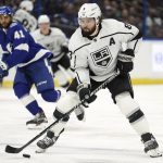 
              Los Angeles Kings defenseman Drew Doughty (8) gets ahead of Tampa Bay Lightning center Pierre-Edouard Bellemare (41) during the third period of an NHL hockey game Tuesday, Dec. 14, 2021, in Tampa, Fla. (AP Photo/Chris O'Meara)
            