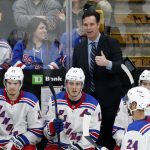 
              FILE - New York Rangers coach David Quinn gestures from the bench during the third period of the team's NHL hockey game against the Boston Bruins in Boston on Jan. 19, 2019. On Monday, Dec. 27, 2021, Quinn was named the U.S. men's hockey coach and John Vanbiesbrouck general manager for the upcoming Winter Olympics after the NHL decided not to send players to Beijing. (AP Photo/Mary Schwalm, File)
            
