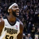 
              Purdue forward Trevion Williams celebrates after the team's 77-70 win over Iowa in an NCAA college basketball game in West Lafayette, Ind., Friday, Dec. 3, 2021. (AP Photo/Michael Conroy)
            