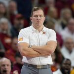 
              Iowa State head coach T.J. Otzelberger watches from the bench during the first half of an NCAA college basketball game against Jackson State, Sunday, Dec. 12, 2021, in Ames, Iowa. (AP Photo/Charlie Neibergall)
            