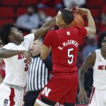 
              North Carolina State's Cam Hayes (3) pressures Nebraska's Bryce McGowens (5) during the first half of an NCAA college basketball game in Raleigh, N.C., Wednesday, Dec. 1, 2021. (Ethan Hyman/The News & Observer via AP)
            