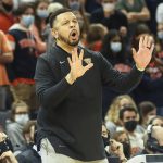 
              Pittsburgh head coach Jeff Capel III reacts to a play during an NCAA college basketball game against Virginia in Charlottesville, Va., Friday, Dec. 3, 2021. (AP Photo/Andrew Shurtleff)
            
