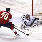 
              Los Angeles Kings goaltender Jonathan Quick (32) blocks a shot on goal by Florida Panthers right wing Patric Hornqvist (70) during the second period at an NHL hockey game, Thursday, Dec. 16, 2021, in Sunrise, Fla. (AP Photo/Marta Lavandier)
            