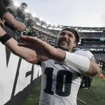 
              Philadelphia Eagles quarterback Gardner Minshew celebrates with fans after an NFL football game against the New York Jets, Sunday, Dec. 5, 2021, in East Rutherford, N.J. (AP Photo/Bill Kostroun)
            