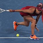 
              FILE - Naomi Osaka, of Japan, plays Marketa Vondrousova, of the Czech Republic, during the third round of the tennis competition at the 2020 Summer Olympics, Tuesday, July 27, 2021, in Tokyo, Japan. Osaka’s 2021 experiences, and how she talked about them, helped drive a robust conversation about athletes’ emotional health. (AP Photo/Seth Wenig, File)
            