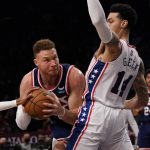 
              Philadelphia 76ers forward Danny Green (14) guards against Brooklyn Nets forward Blake Griffin, left, during the second half of an NBA basketball game, Thursday, Dec. 16, 2021, in New York. (AP Photo/Mary Altaffer)
            