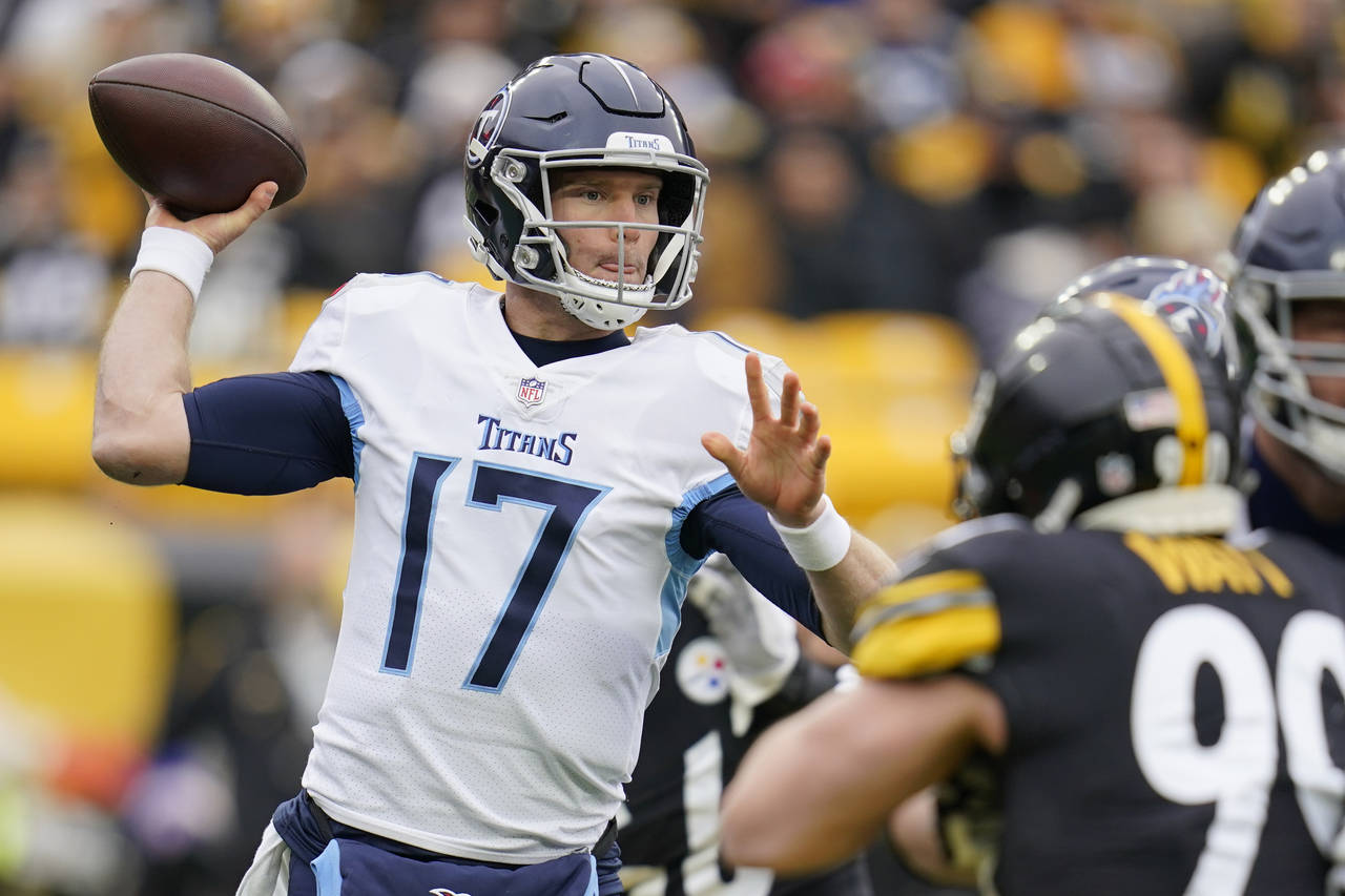 Tennessee Titans quarterback Ryan Tannehill (17) passes as Pittsburgh Steelers outside linebacker T...