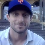 
              This still image from video shows New York Mets pitcher Max Scherzer in his new team cap during a news conference, Wednesday, Dec. 1, 2021. The Mets and the three-time Cy Young Award winner finalized a $130 million, three-year deal Wednesday, a contract that shattered baseball's record for highest average salary and forms a historically impressive 1-2 atop New York's rotation with Jacob deGrom. (New York Mets via AP)
            