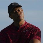 
              Tiger Woods gestures during the trophy ceremony of the Hero World Challenge PGA Tour at the Albany Golf Club, in New Providence, Bahamas, Sunday, Dec. 5, 2021.(AP Photo/Fernando Llano)
            