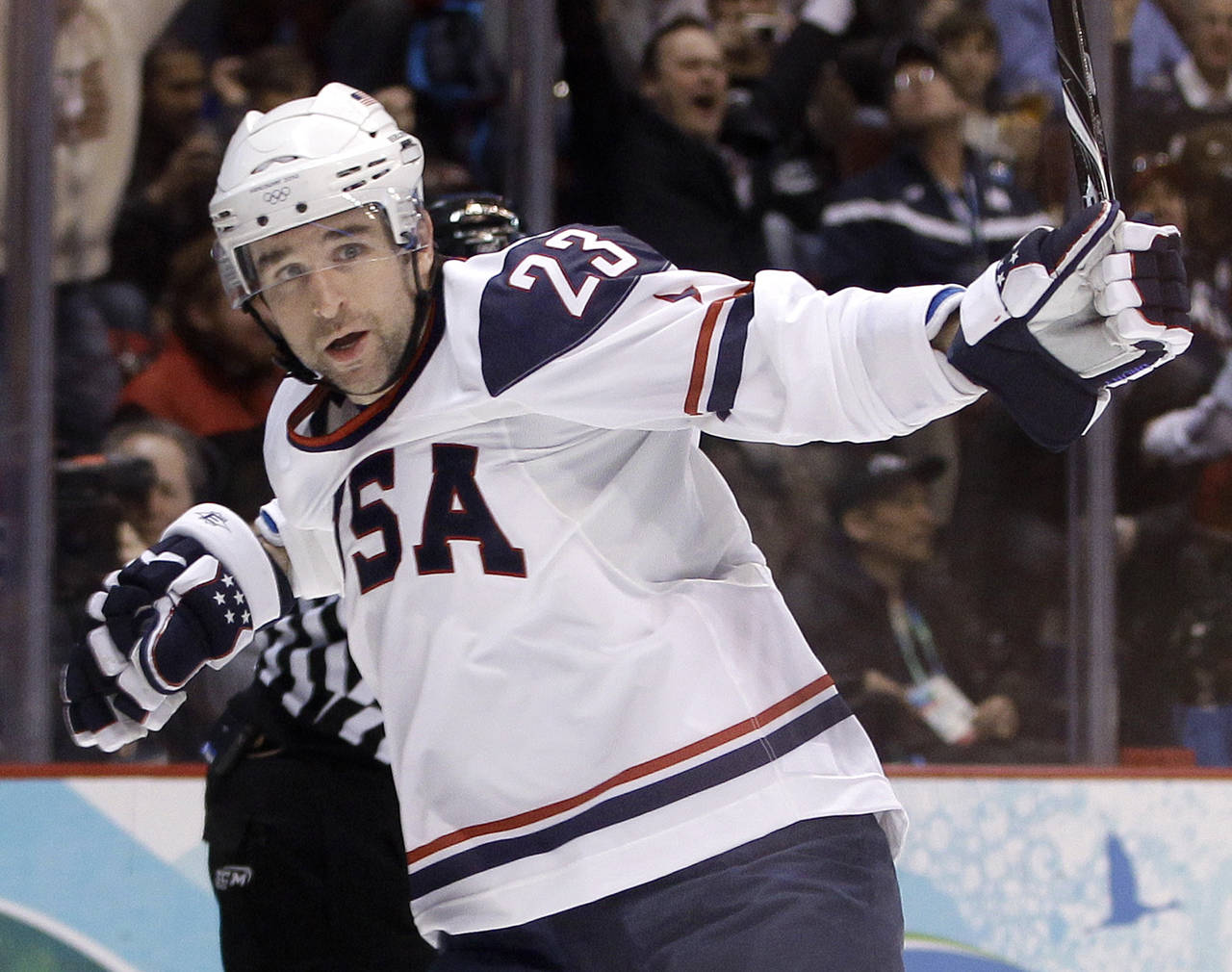FILE - USA's Chris Drury celebrates after scoring against Norway in the first period of a prelimina...